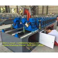 Roofing system roll forming machine